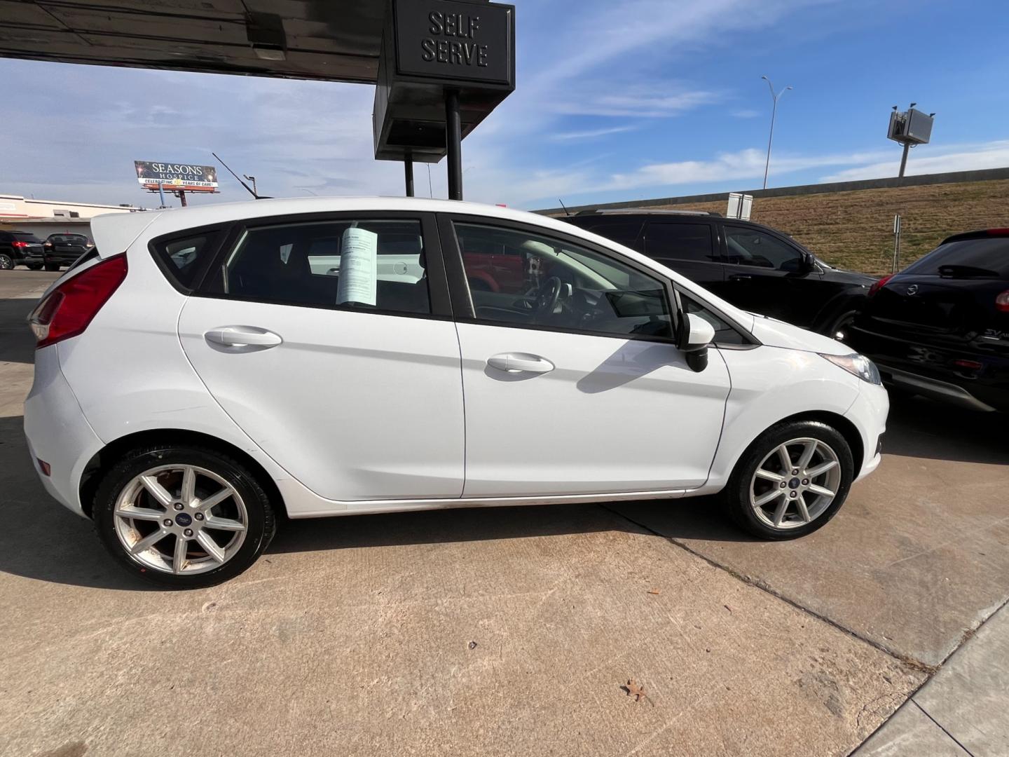 2019 WHITE FORD FIESTA SE SE Hatchback (3FADP4EJ2KM) with an 1.6L L4 DOHC 16V engine, located at 8101 E. Skelly Dr., Tulsa, OK, 74129, (918) 592-3593, 36.121891, -95.888802 - Photo#3